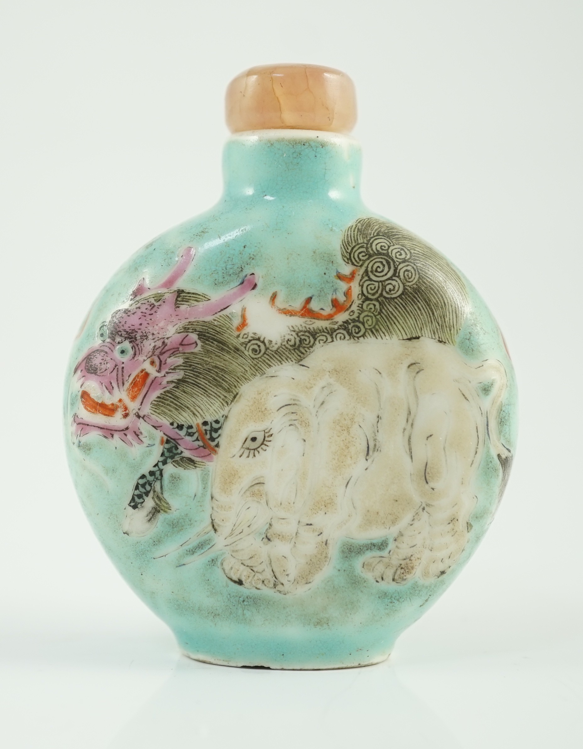 A Chinese enamelled porcelain ‘mythical beasts’ snuff bottle, 1850-1900, 5.6cm, splinter chips to foot